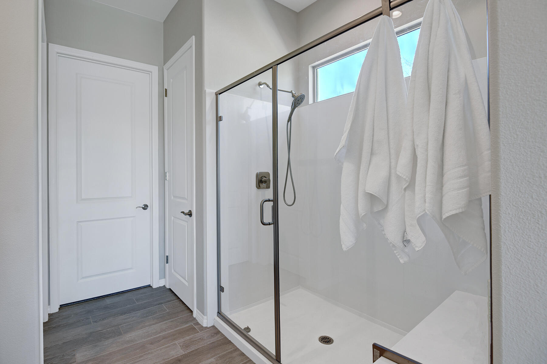 58 Claret Road Rancho Mirage, CA 92270 - Photo 12 of 33 a bathroom with a glass shower door