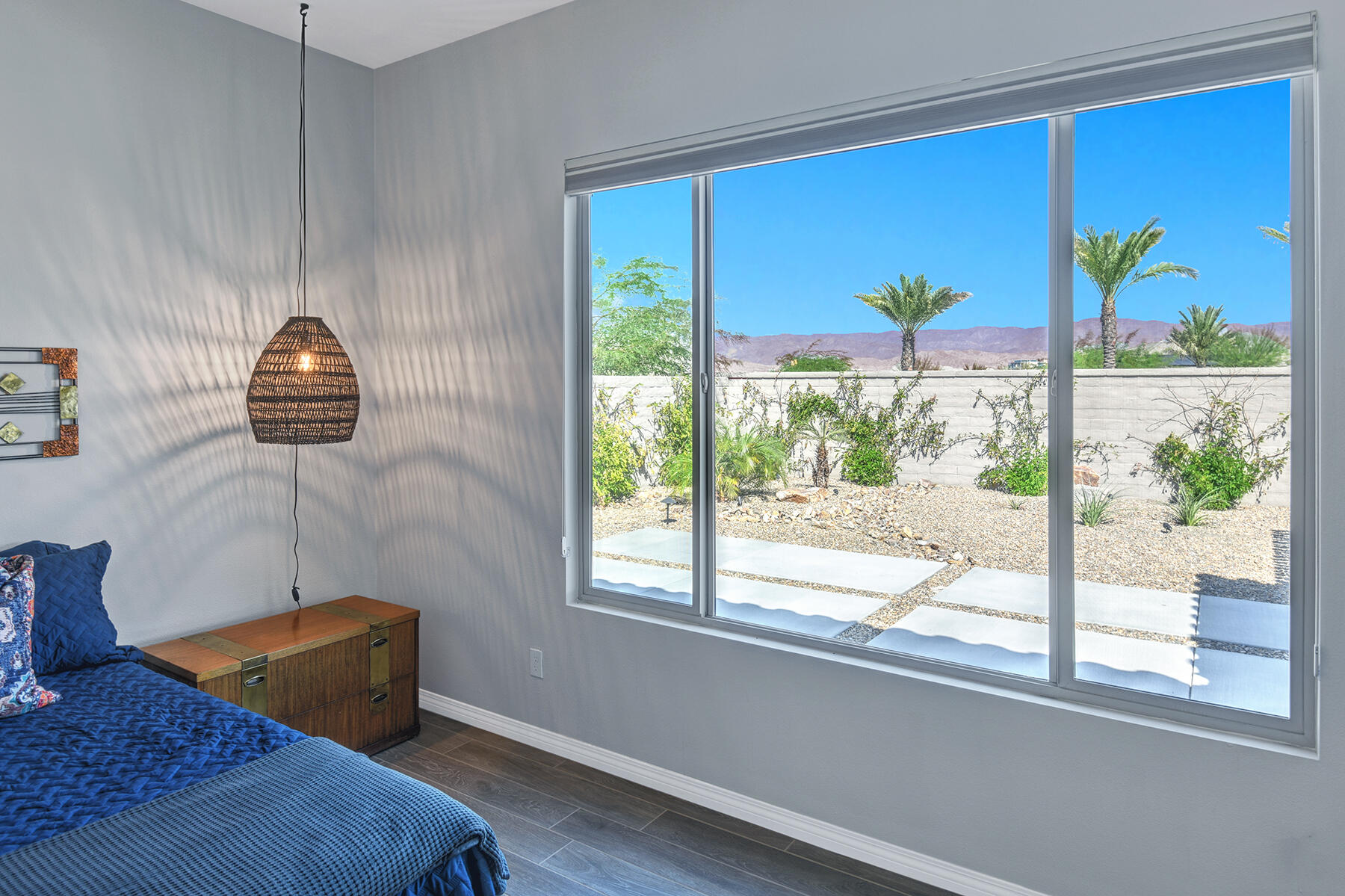 58 Claret Road Rancho Mirage, CA 92270 - Photo 26 of 33 a bedroom with a bed and a window