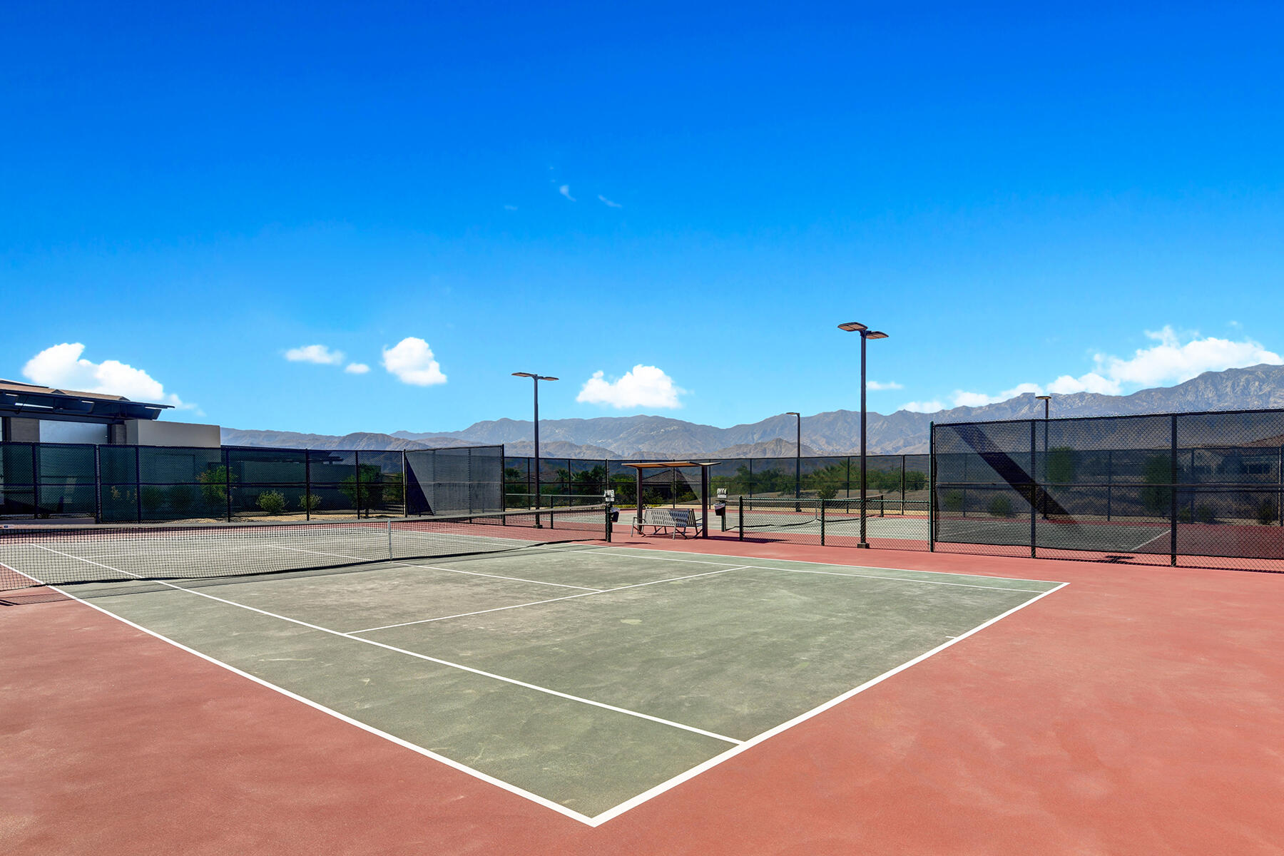 58 Claret Road Rancho Mirage, CA 92270 - Photo 32 of 33 a tennis court with view of palm trees
