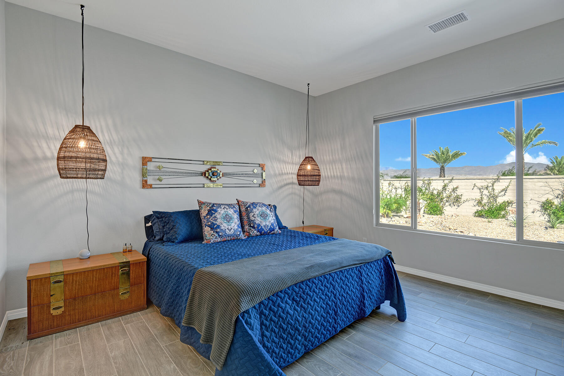 58 Claret Road Rancho Mirage, CA 92270 - Photo 10 of 33 a bedroom with a bed and a window