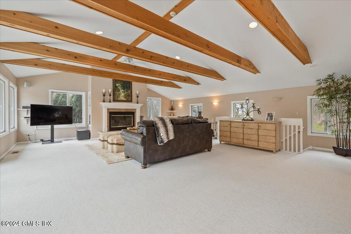 693 Den Road Stamford, CT 06903 - Photo 5 of 32 a living room with furniture and a flat screen tv