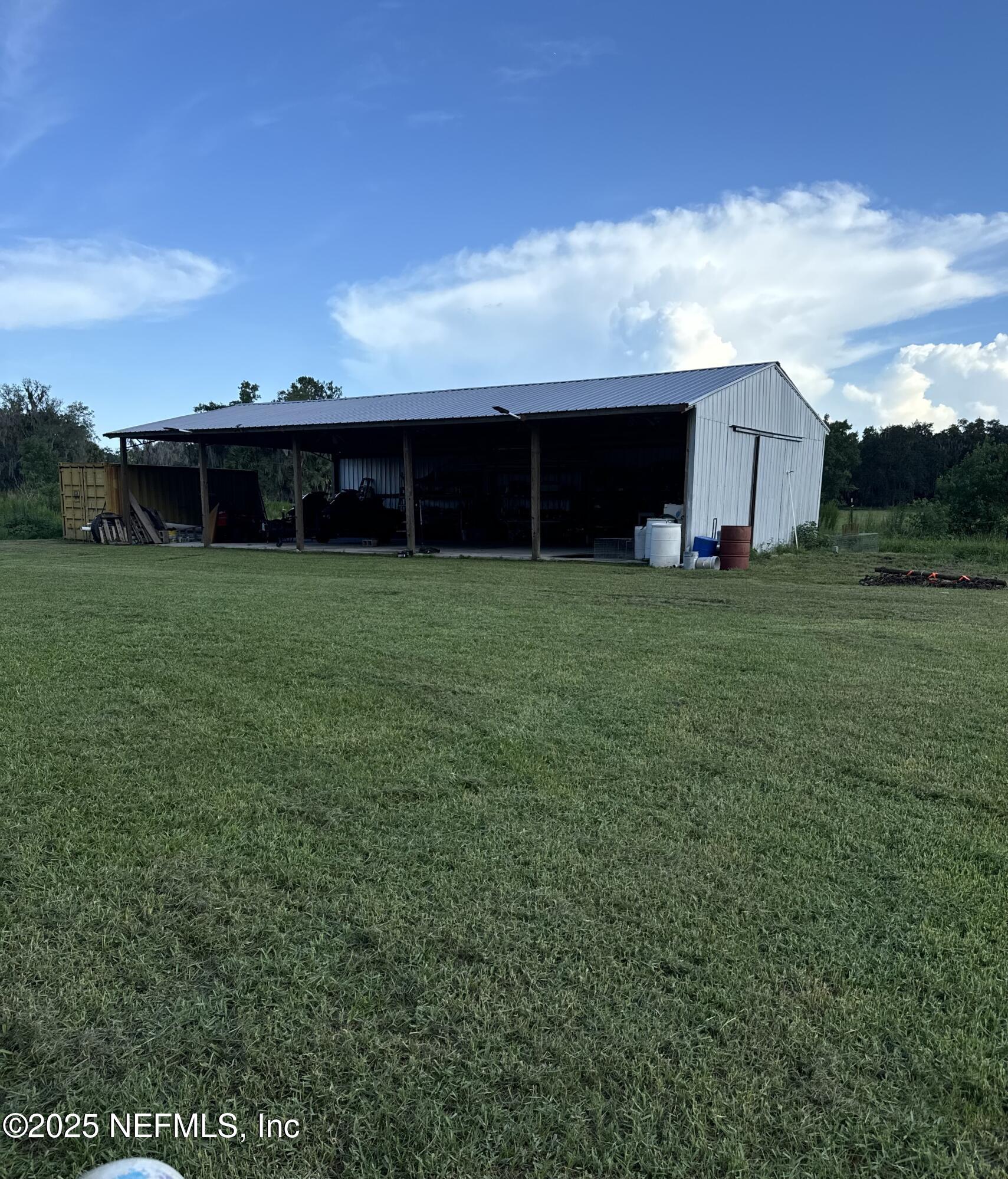 8995 Barrel Factory Road Hastings, FL 32145 - Photo 21 of 23 a view of a backyard