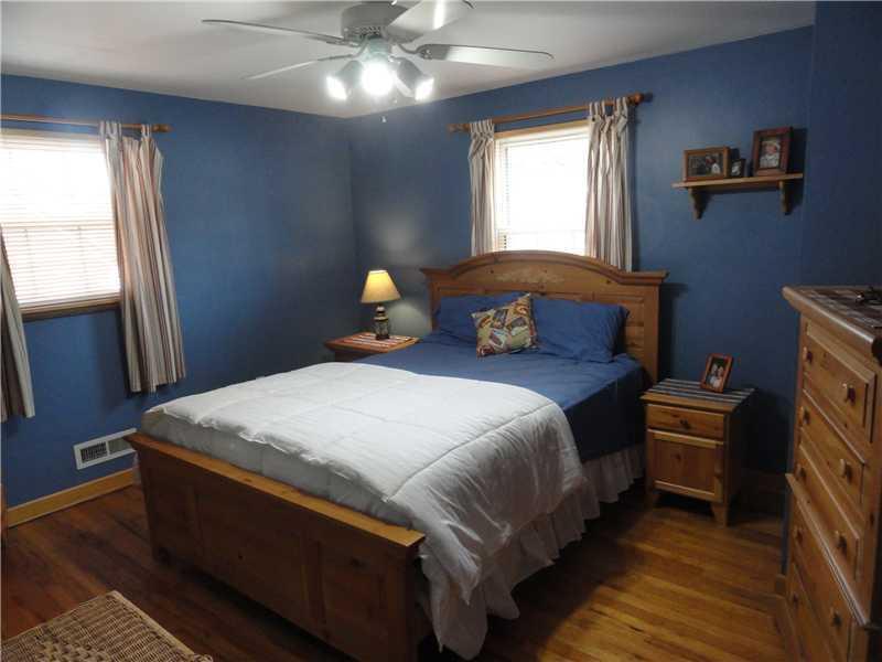 1937 Bower Hill Road Pittsburgh, PA 15243 - Photo 13 of 24 Master Bedroom. The first floor 14 x 11 Master bedroom has gleaming hardwood flooring. There is a ceiling fan and window treatments are staying with this home.