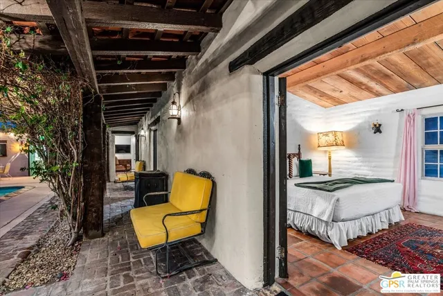 a view of living room and patio