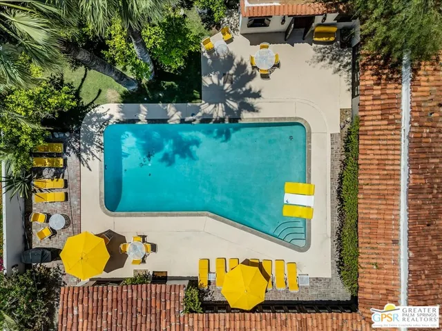 a view of a swimming pool with a patio