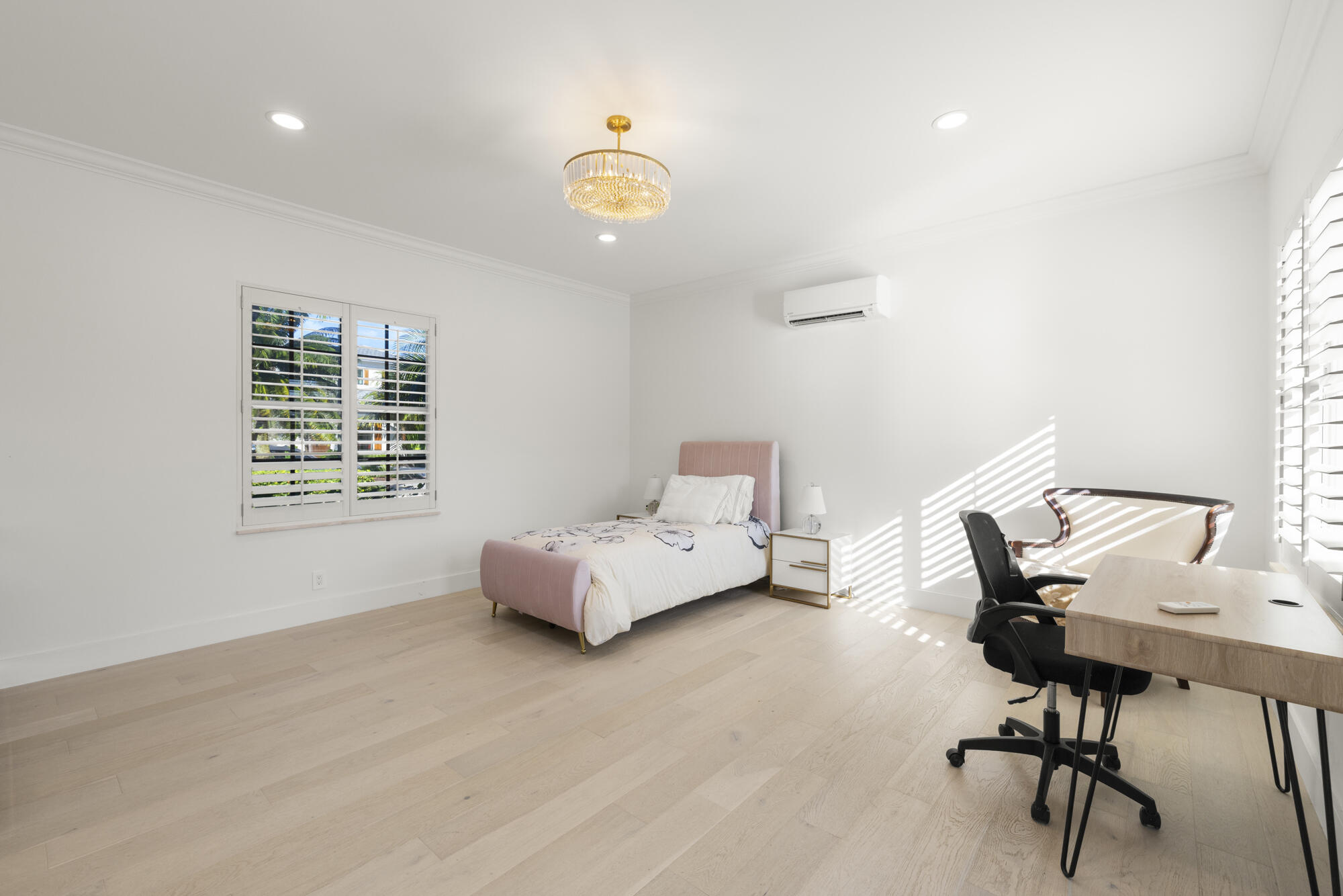 325 Eagle Drive Jupiter, FL 33477 - Photo 31 of 51 a living room with furniture and a window