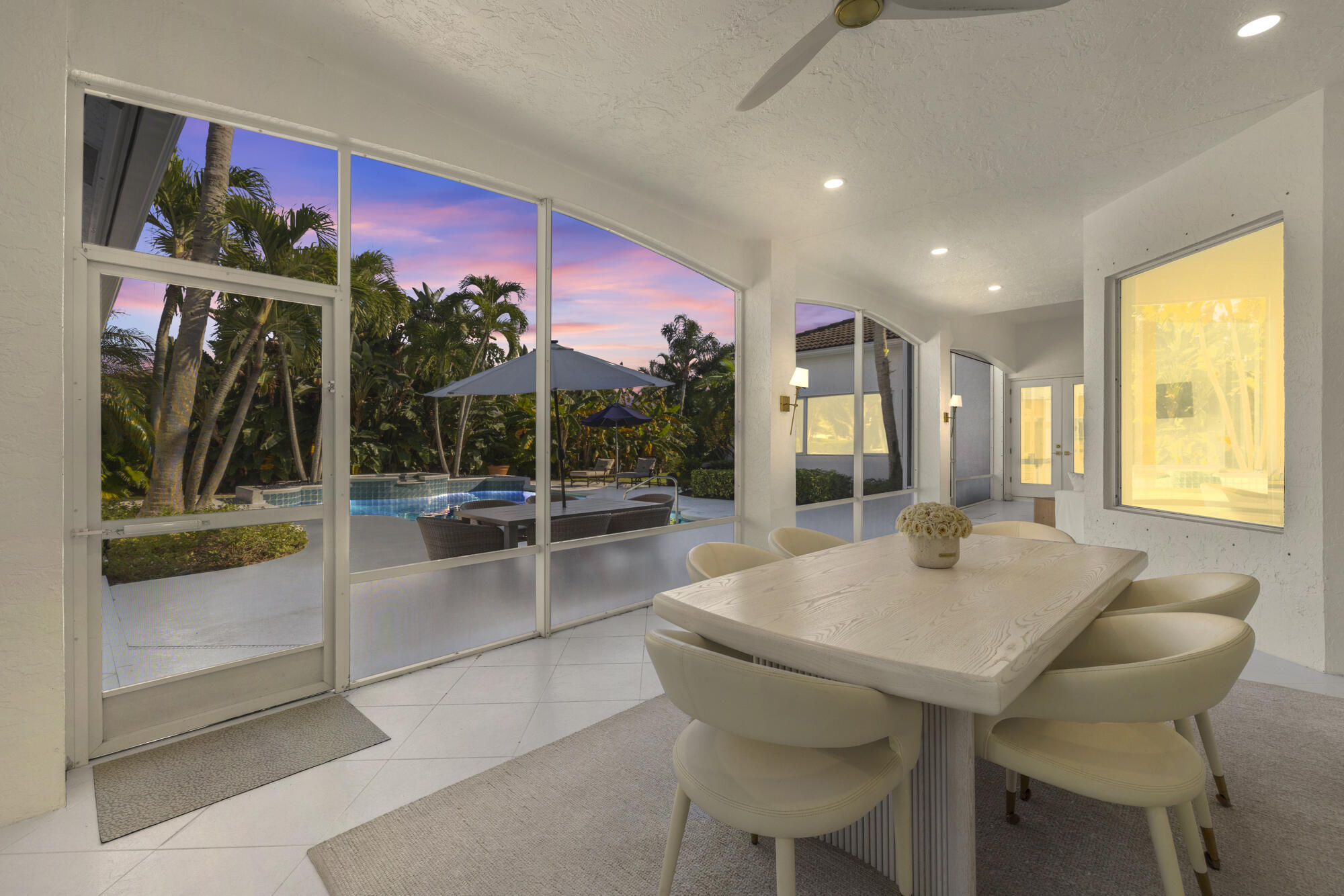 325 Eagle Drive Jupiter, FL 33477 - Photo 35 of 51 a view of a dining room with furniture and window