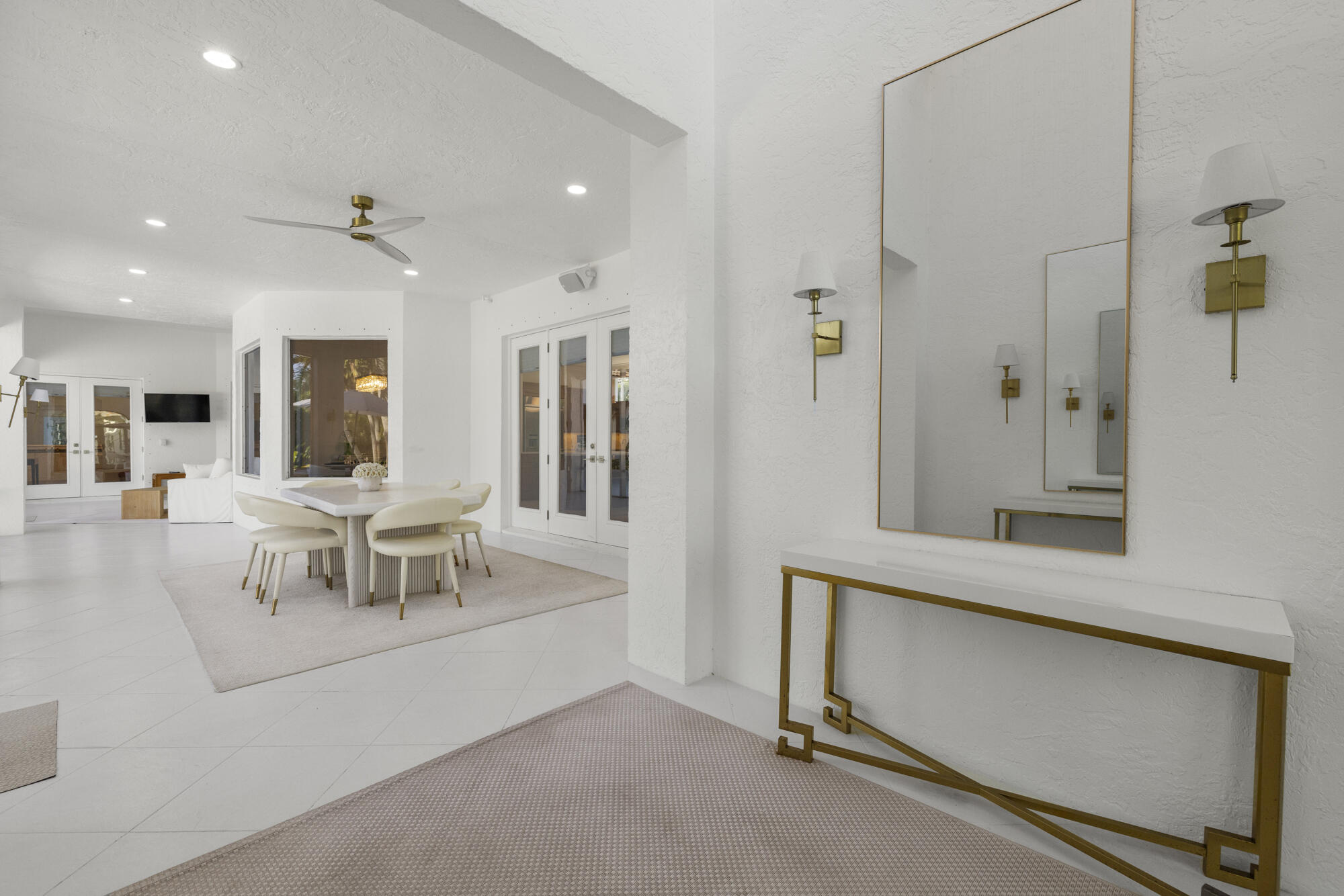 325 Eagle Drive Jupiter, FL 33477 - Photo 5 of 51 a living room with furniture