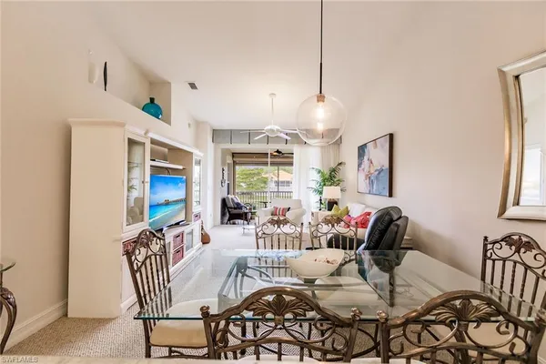 a view of a a dining room with furniture
