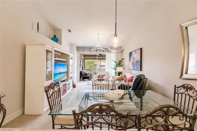 a view of a a dining room with furniture
