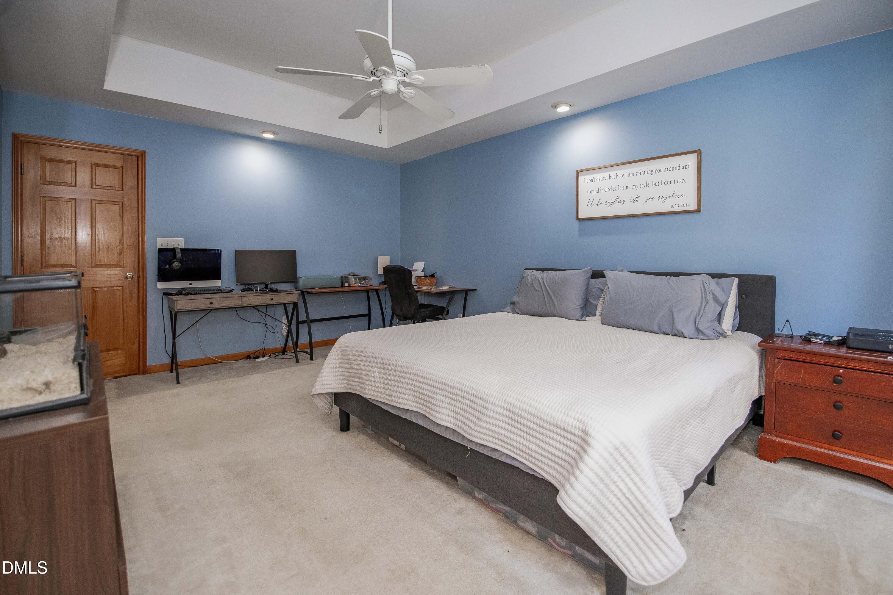 123 Chris Court Garner, NC 27529 - Photo 16 of 24 a bedroom with a bed and furniture