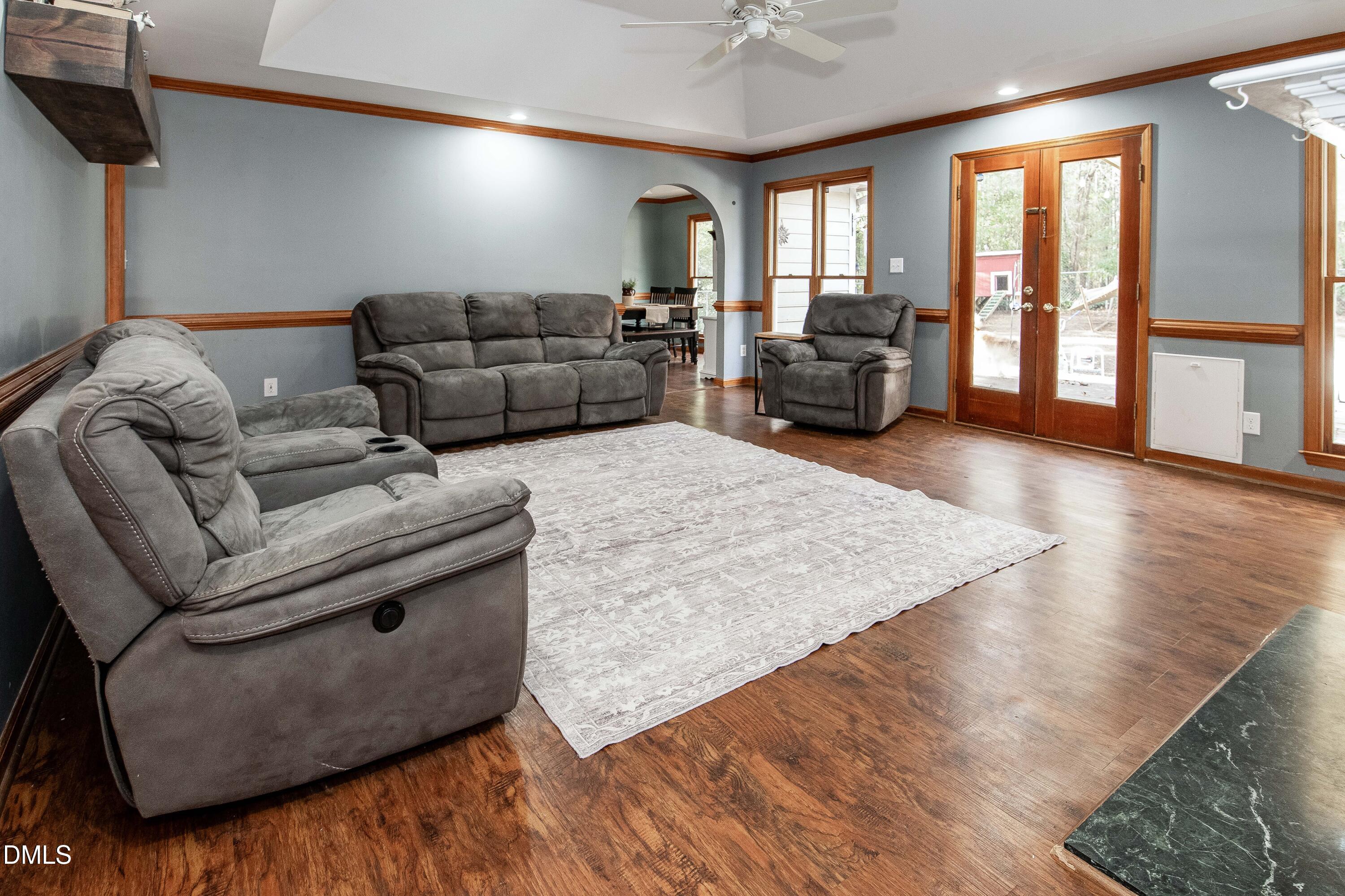 123 Chris Court Garner, NC 27529 - Photo 4 of 24 a living room with furniture and large windows