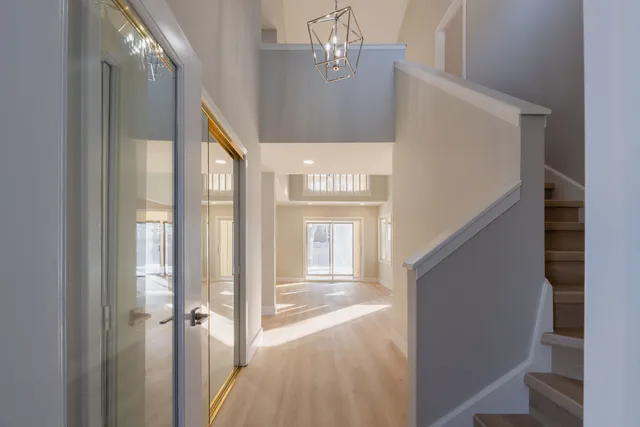 a bedroom with bed and window
