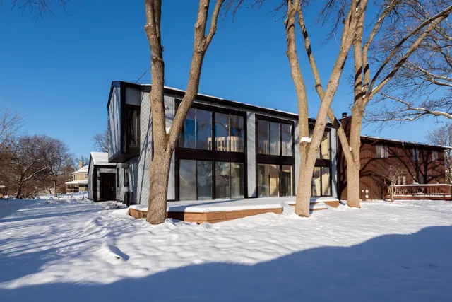 a view of a street with a building in the background