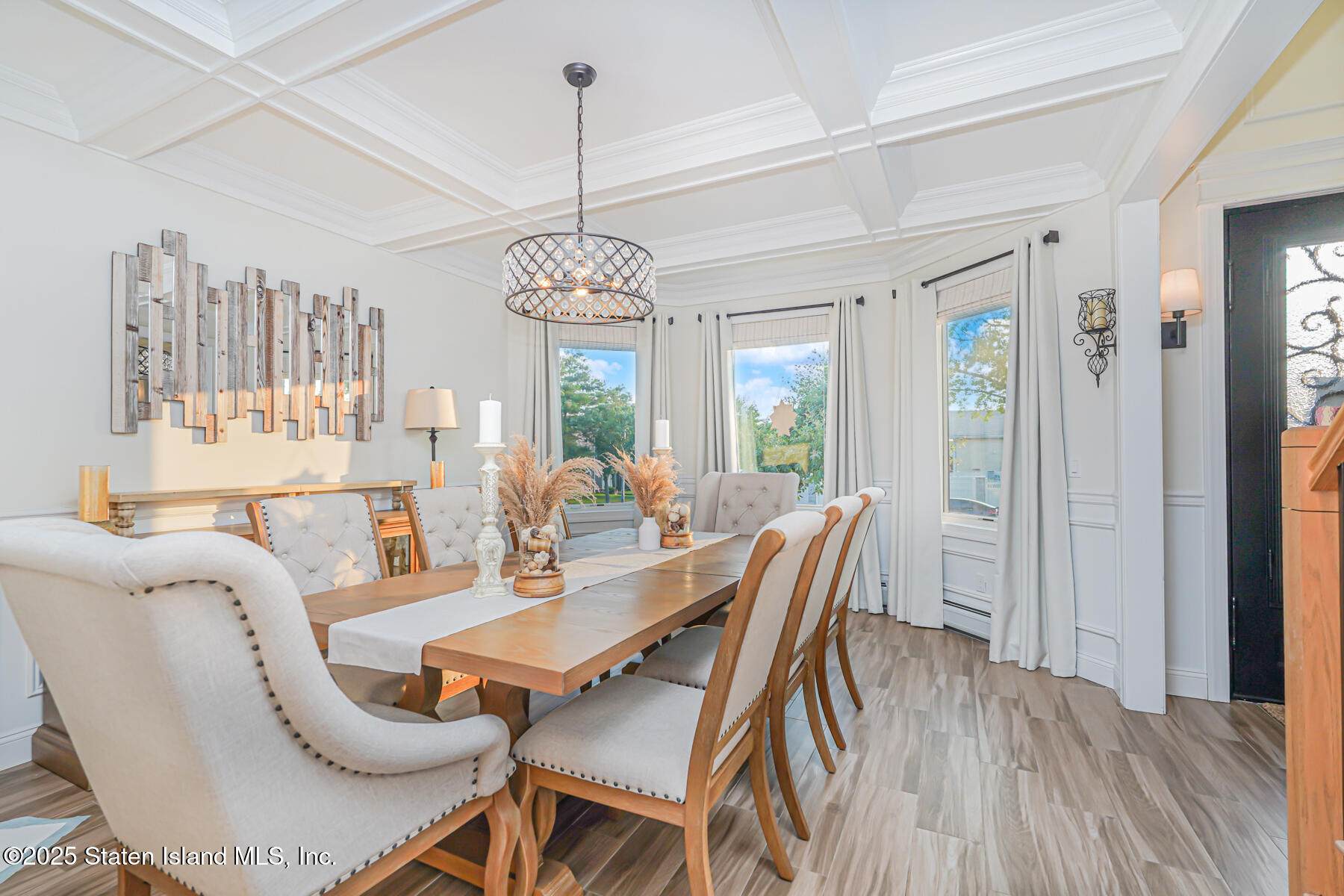 239 Vernon Avenue Staten Island, NY 10309 - Photo 11 of 67 a view of a dining room with furniture window and wooden floor