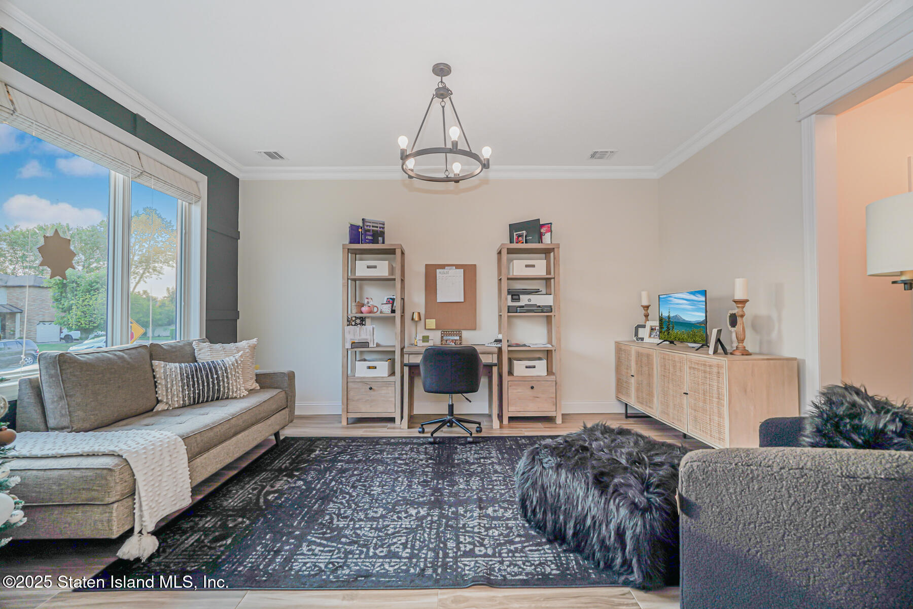 239 Vernon Avenue Staten Island, NY 10309 - Photo 12 of 67 a living room with furniture and a window