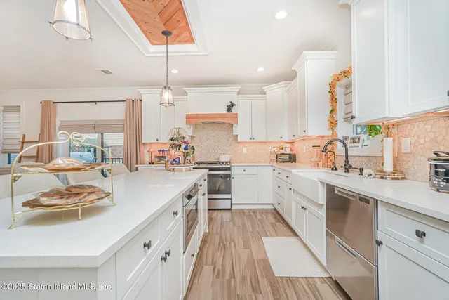 a bedroom with a bed and lamp