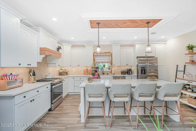 a view of an empty room and workspace