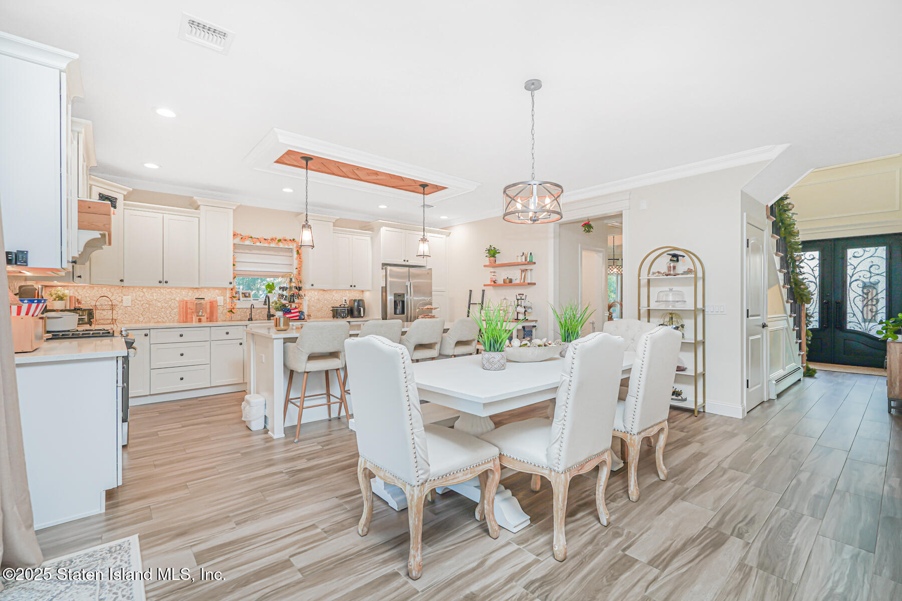 239 Vernon Avenue Staten Island, NY 10309 - Photo 26 of 67 a view of a dining room with furniture window and wooden floor