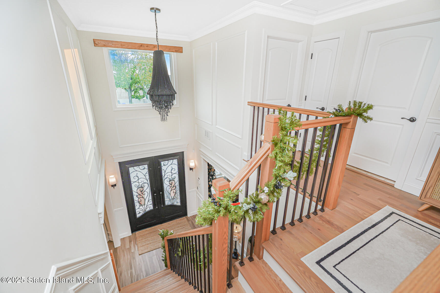 239 Vernon Avenue Staten Island, NY 10309 - Photo 30 of 67 a view of an entryway with wooden floor and windows