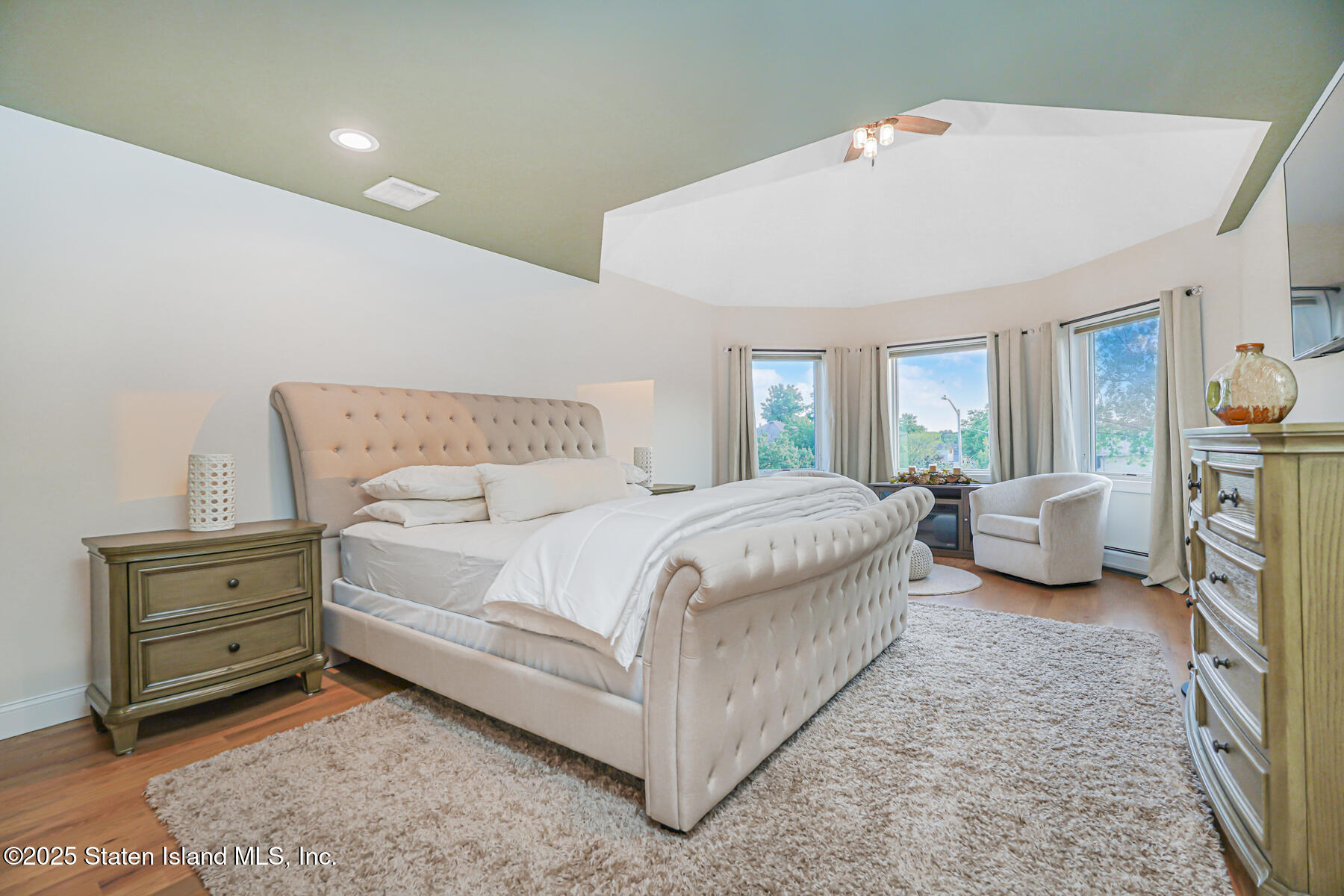 239 Vernon Avenue Staten Island, NY 10309 - Photo 33 of 67 a bedroom with a bed and lamp