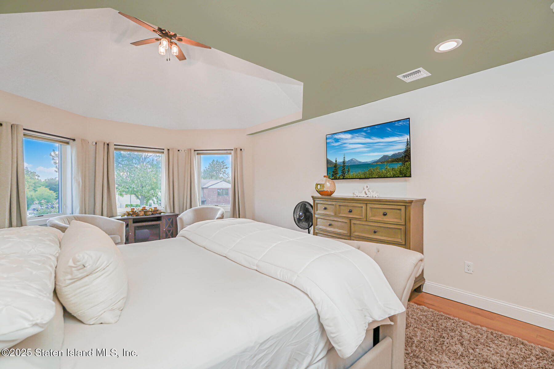 239 Vernon Avenue Staten Island, NY 10309 - Photo 34 of 67 a bedroom with 2 bed and a flat screen tv