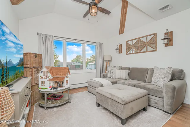 a view of patio with table and chairs