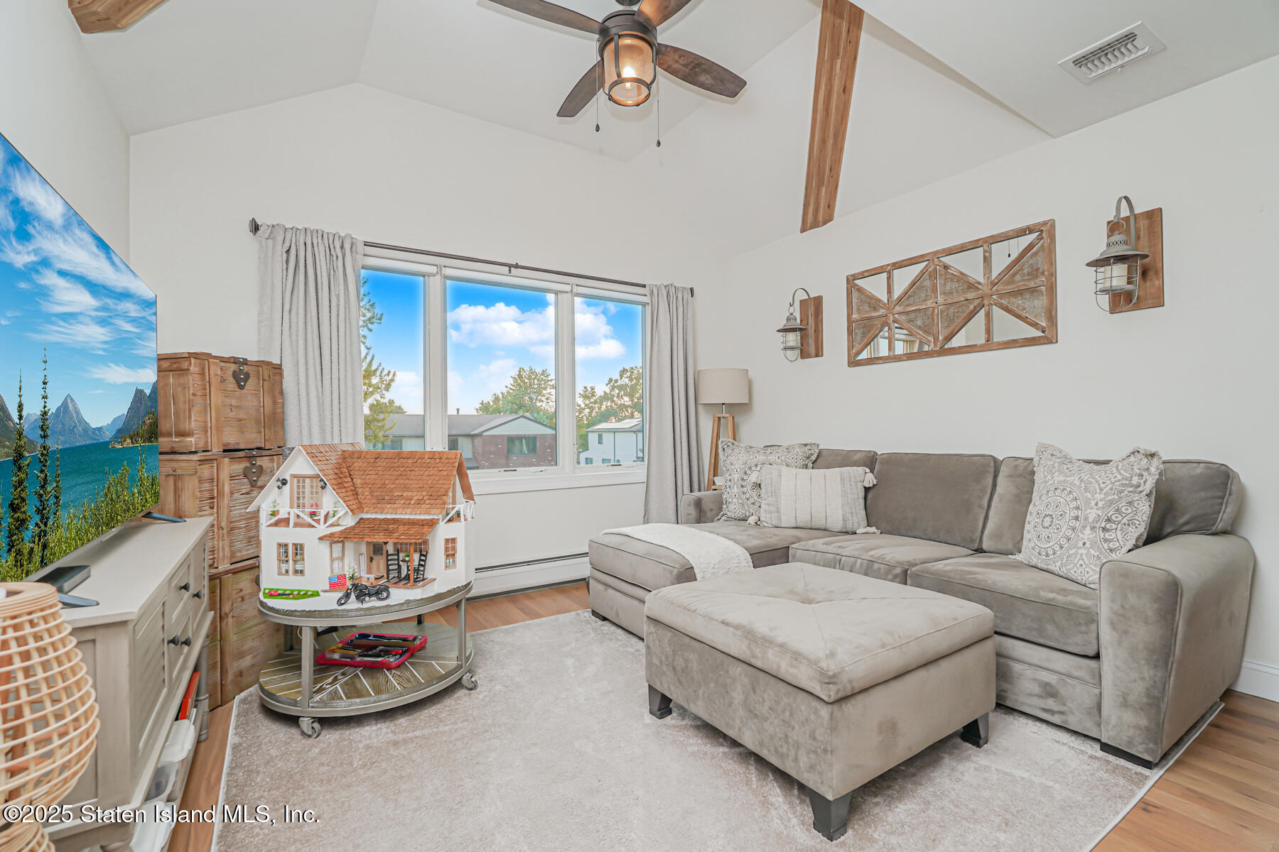 239 Vernon Avenue Staten Island, NY 10309 - Photo 41 of 67 a living room with furniture and a window