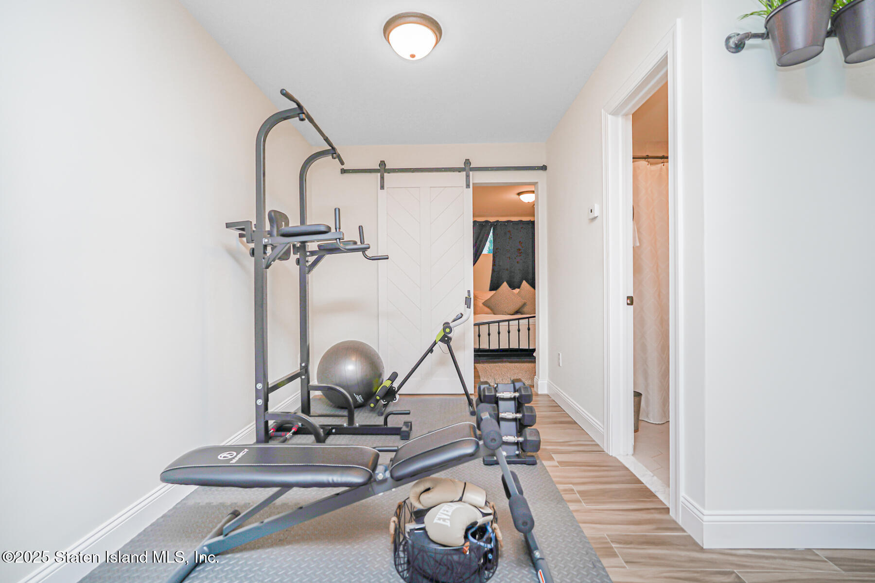 239 Vernon Avenue Staten Island, NY 10309 - Photo 49 of 67 a view of a room with gym equipment