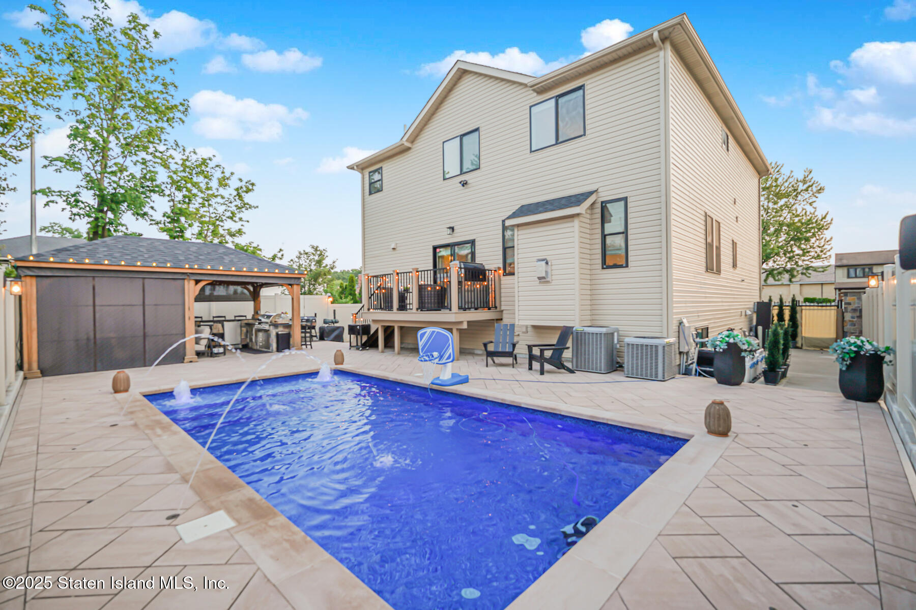 239 Vernon Avenue Staten Island, NY 10309 - Photo 55 of 67 a view of a house with swimming pool and sitting area