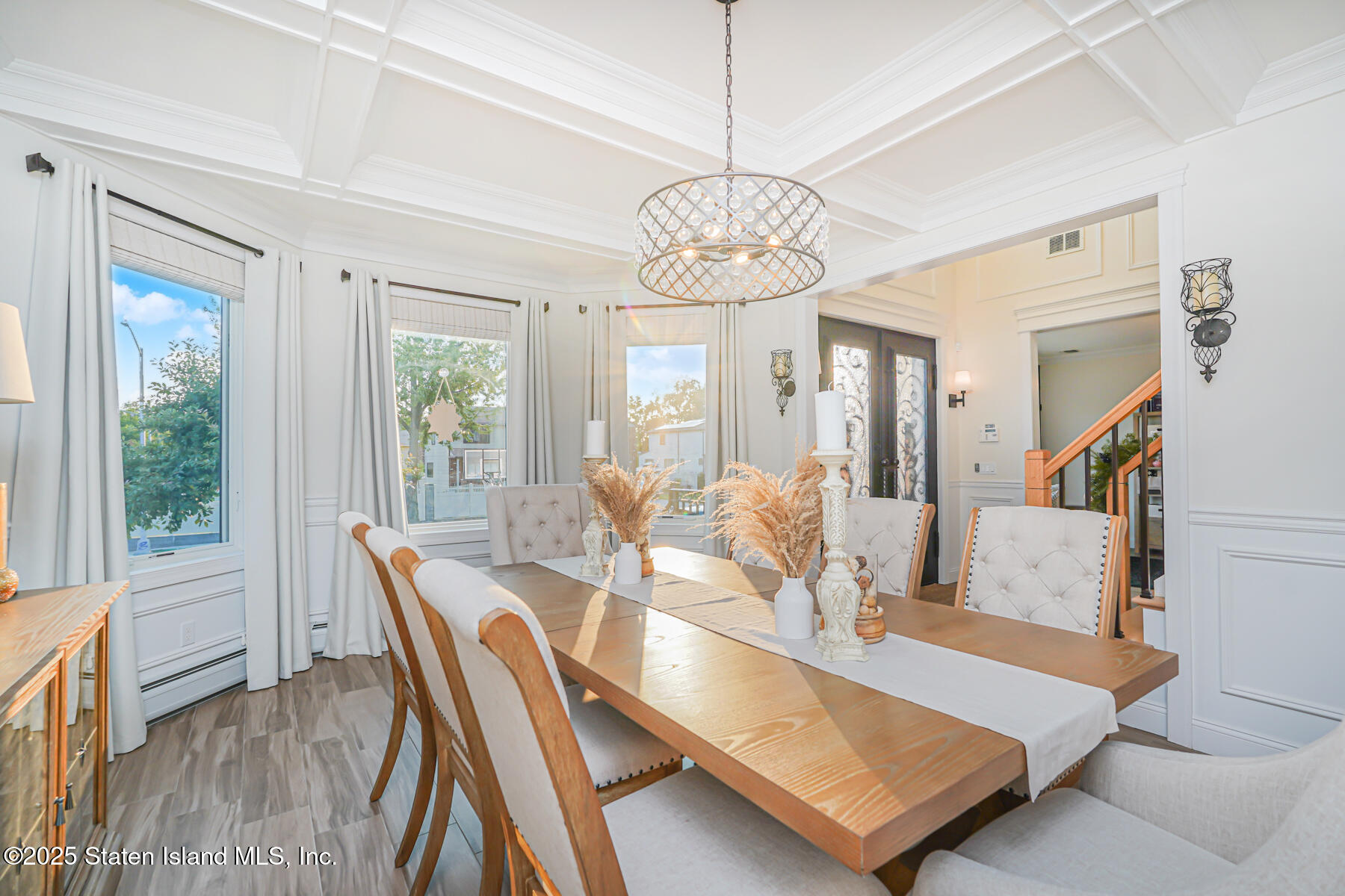 239 Vernon Avenue Staten Island, NY 10309 - Photo 10 of 67 a view of a dining room with furniture wooden floor and chandelier