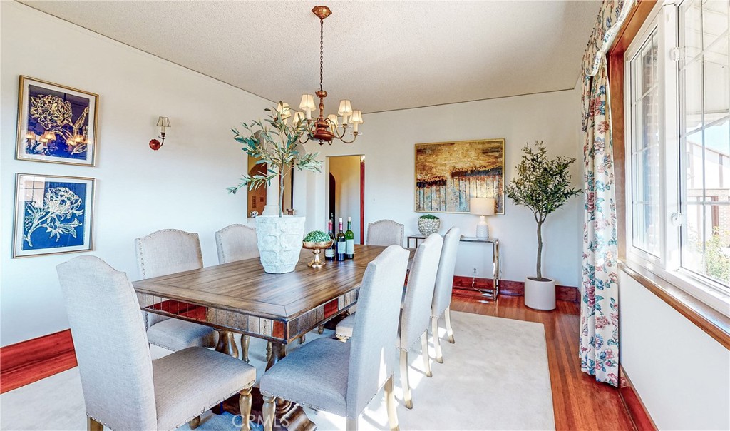 590 Bethany Road Burbank, CA 91504 - Photo 17 of 58 a workspace with furniture and a chandelier