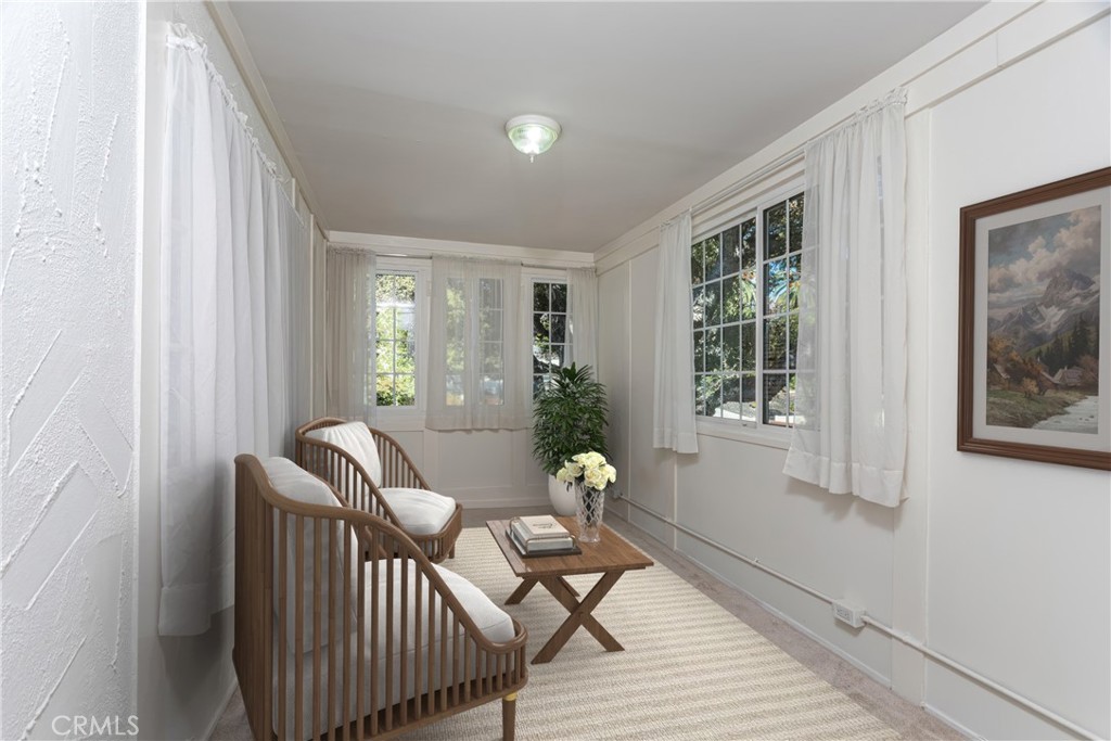 590 Bethany Road Burbank, CA 91504 - Photo 33 of 58 a living room with furniture and wooden floor