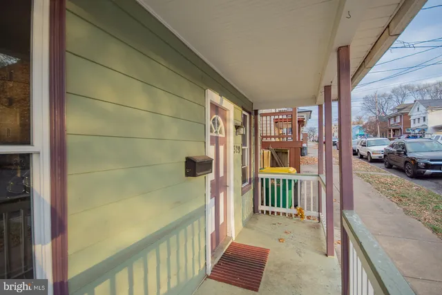 a view of a porch with furniture