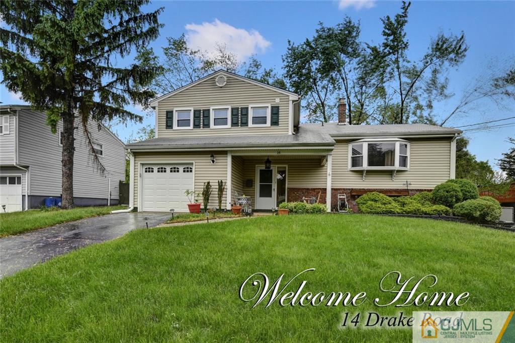14 Drake Road Somerset, NJ 08873 - Photo 1 of 25 a front view of a house with a garden