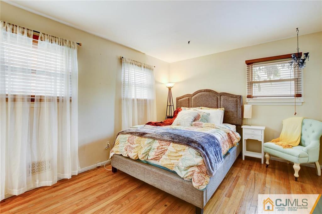 14 Drake Road Somerset, NJ 08873 - Photo 16 of 25 a bedroom with a bed and a window
