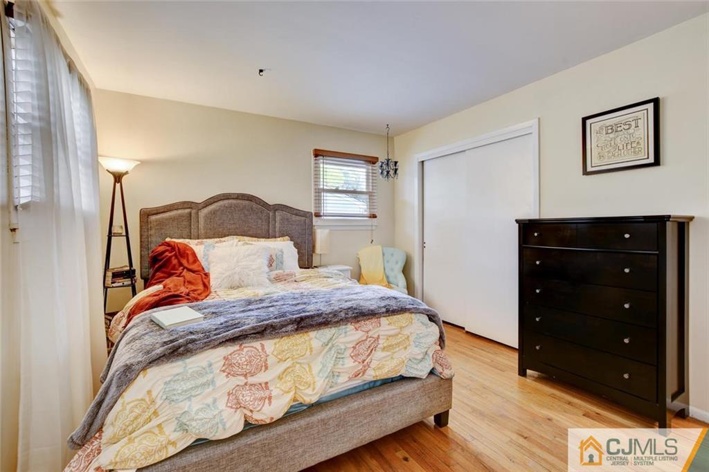 14 Drake Road Somerset, NJ 08873 - Photo 17 of 25 a bedroom with a bed and a dresser
