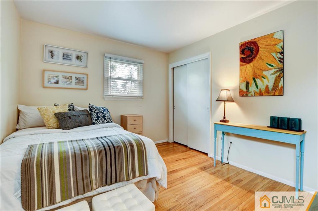 14 Drake Road Somerset, NJ 08873 - Photo 19 of 25 a bedroom with a bed and a desk