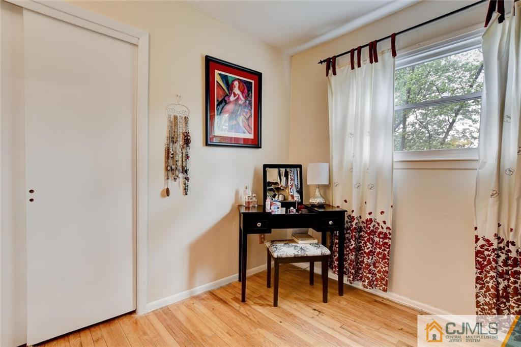 14 Drake Road Somerset, NJ 08873 - Photo 20 of 25 a view of a workspace with furniture and wooden floor