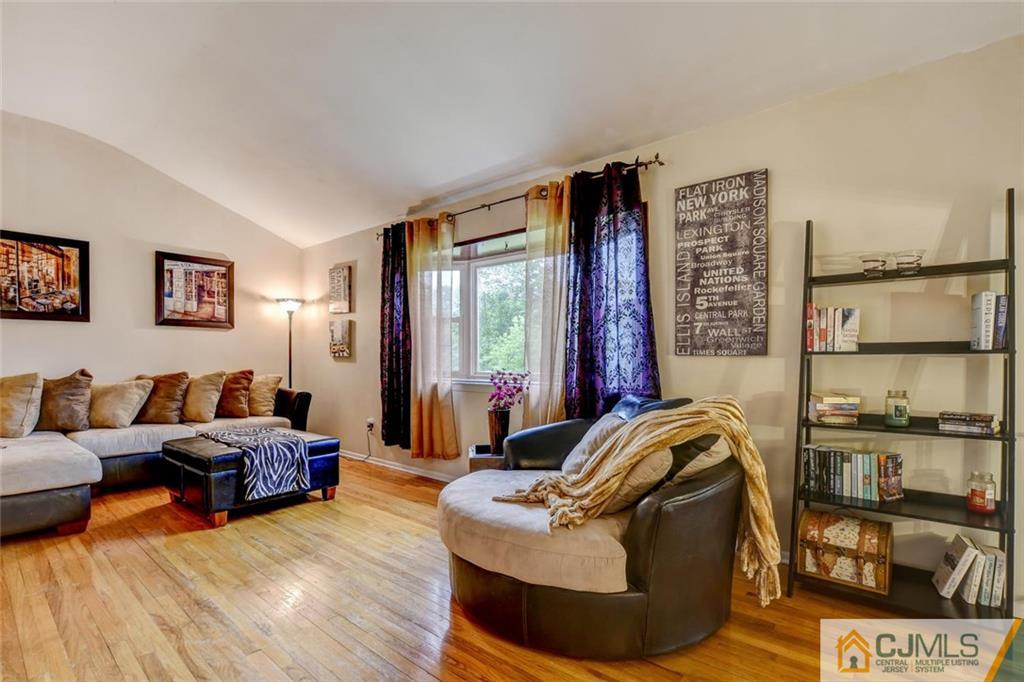 14 Drake Road Somerset, NJ 08873 - Photo 3 of 25 a living room with furniture and a floor to ceiling window
