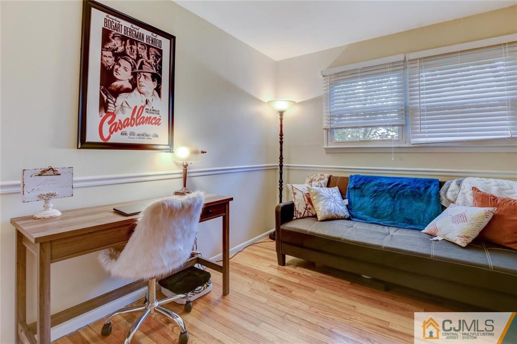 14 Drake Road Somerset, NJ 08873 - Photo 23 of 25 a living room with furniture and a wooden floor