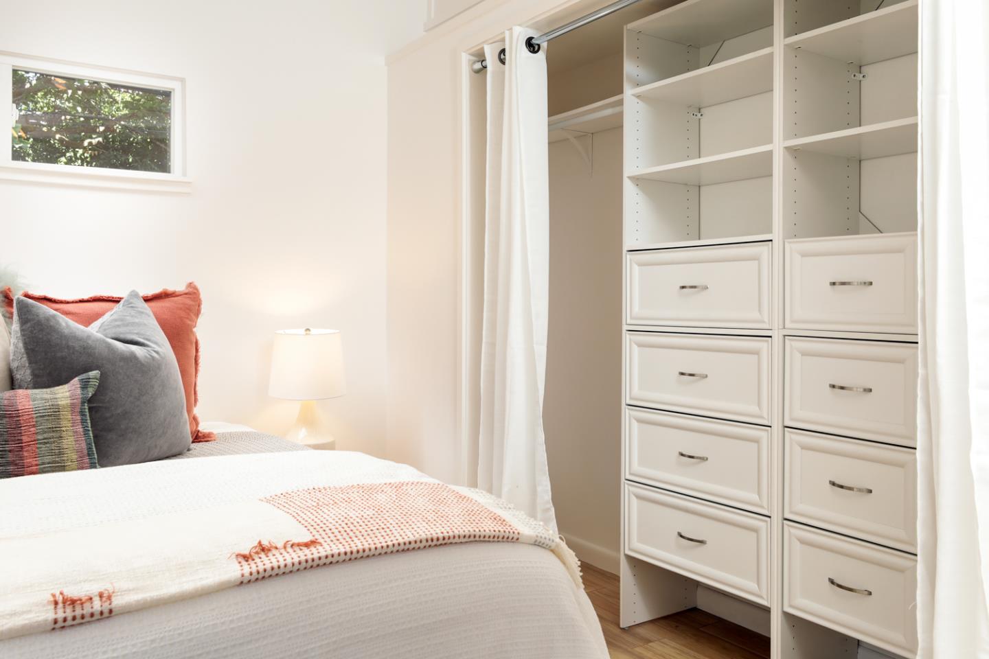 2312 Jane Lane Mountain View, CA 94043 - Photo 12 of 23 a bedroom with a bed and a cabinet