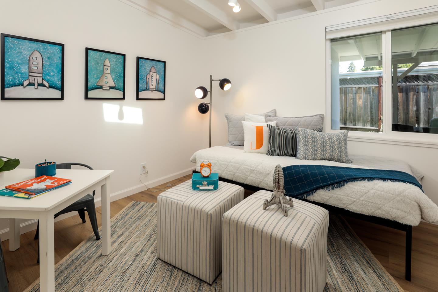 2312 Jane Lane Mountain View, CA 94043 - Photo 14 of 23 a bedroom with two beds and a table