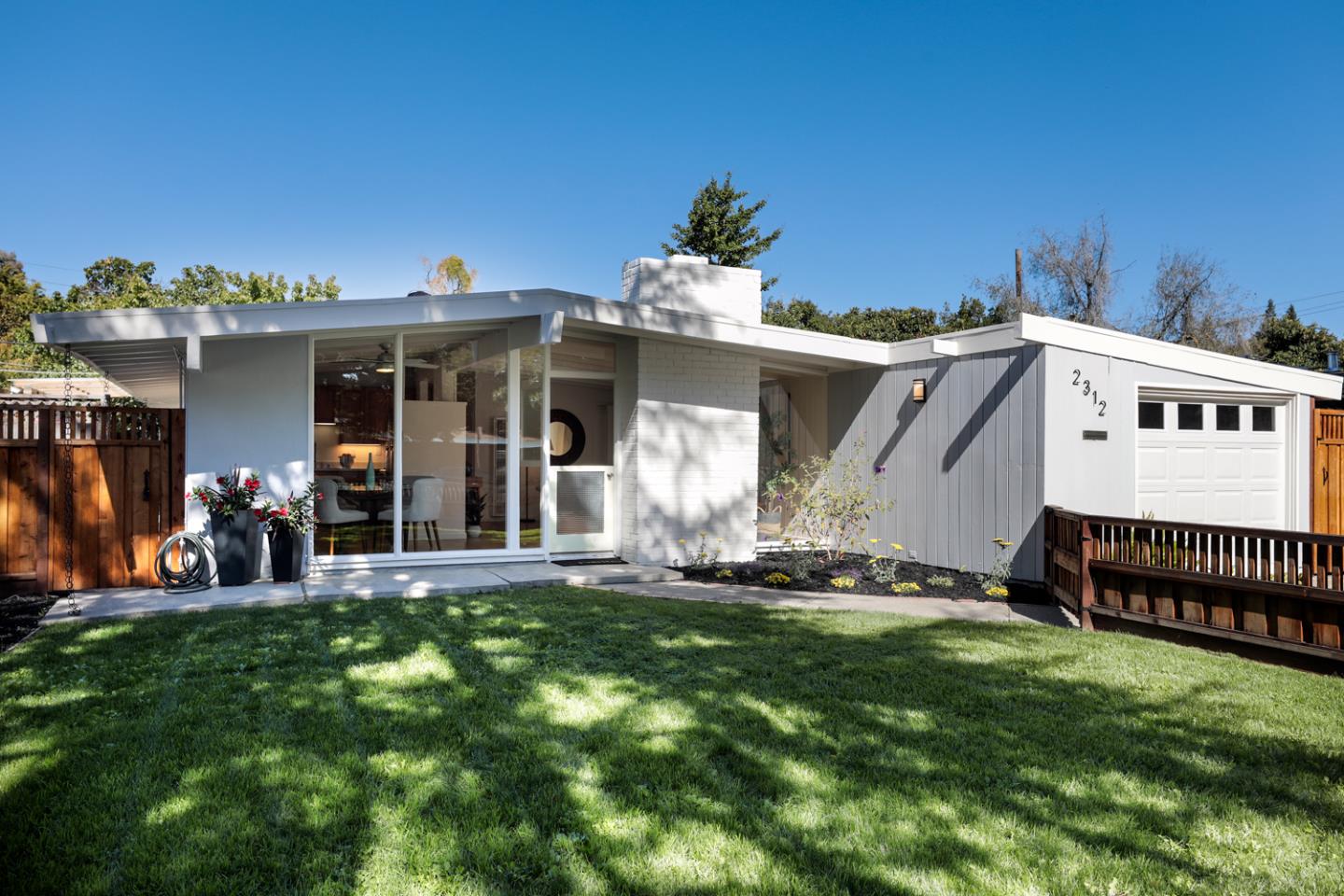 2312 Jane Lane Mountain View, CA 94043 - Photo 4 of 23 a view of a house with yard and deck