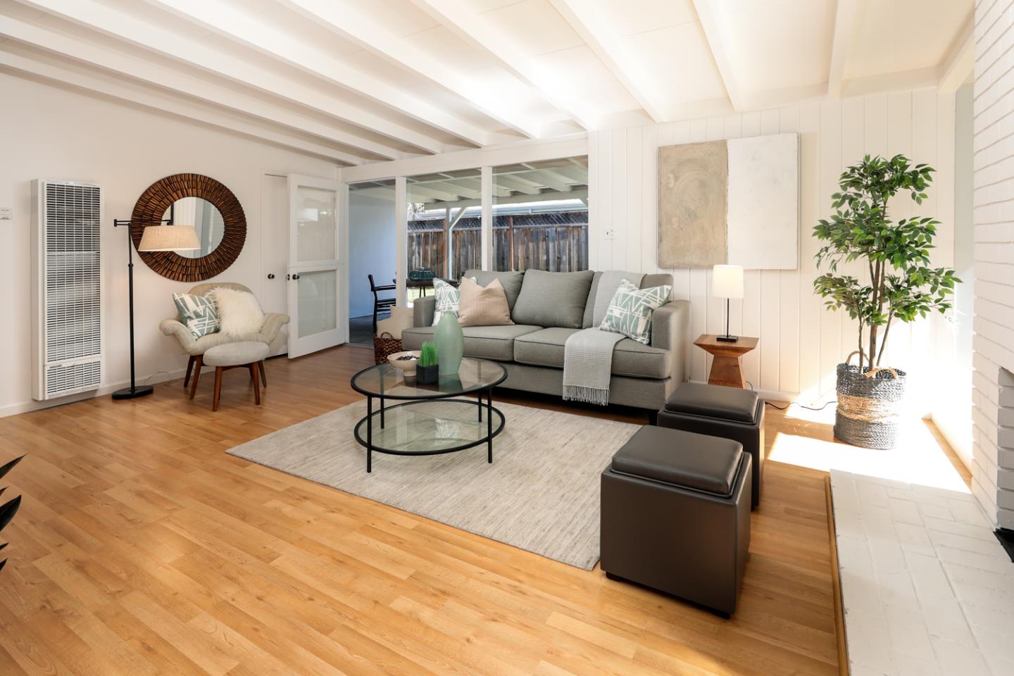 2312 Jane Lane Mountain View, CA 94043 - Photo 6 of 23 a living room with furniture a rug potted plant and a large window