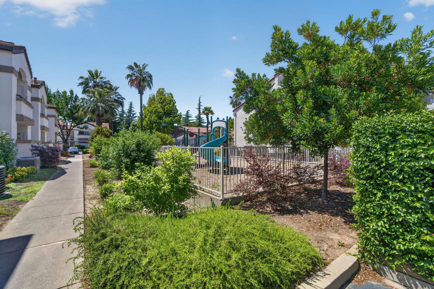 8020 Walerga Road, Unit 1140 Antelope, CA 95843 - Photo 30 of 37 a view of a bench in a garden