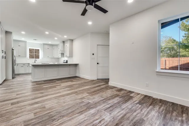 a view of kitchen and windows