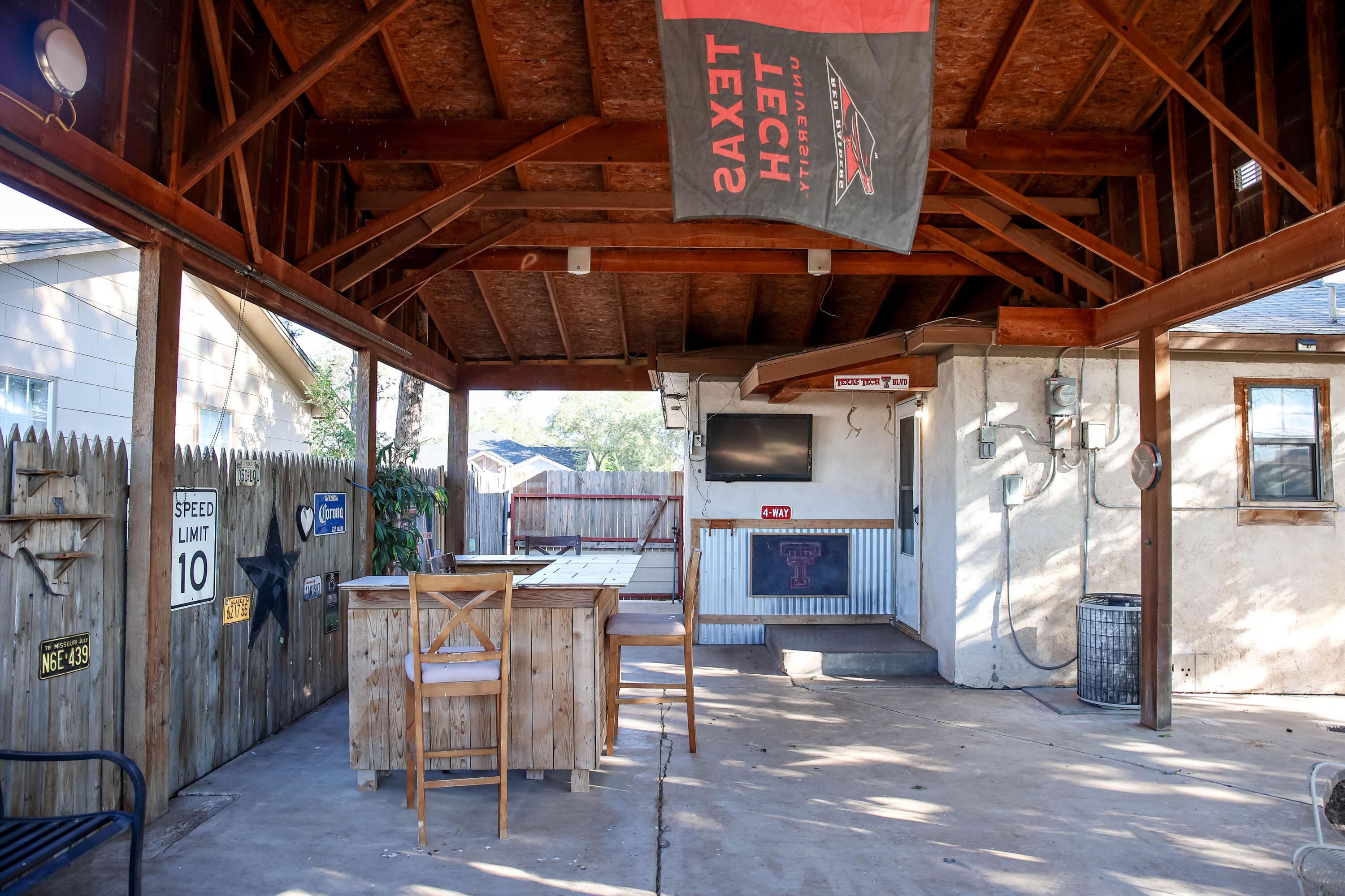 4607 33rd Street Lubbock, TX 79410 - Photo 16 of 22 a view of a chairs and table in a patio