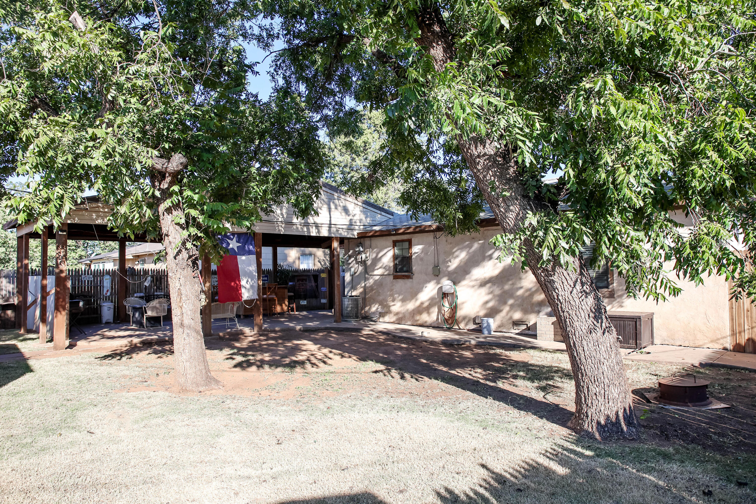 4607 33rd Street Lubbock, TX 79410 - Photo 19 of 22 a view of a park that has a tree in front of it