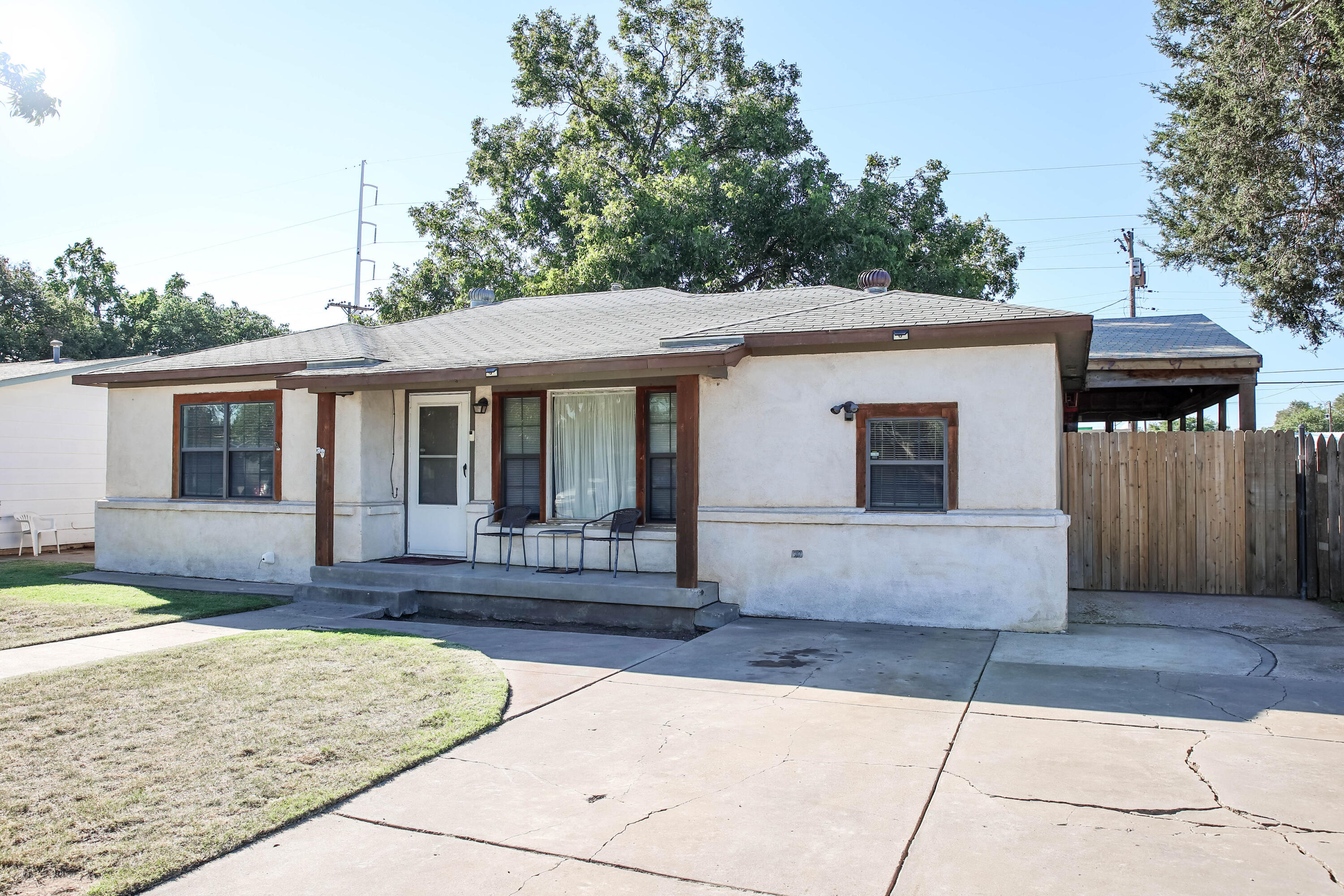 4607 33rd Street Lubbock, TX 79410 - Photo 22 of 22 a front view of a house with yard